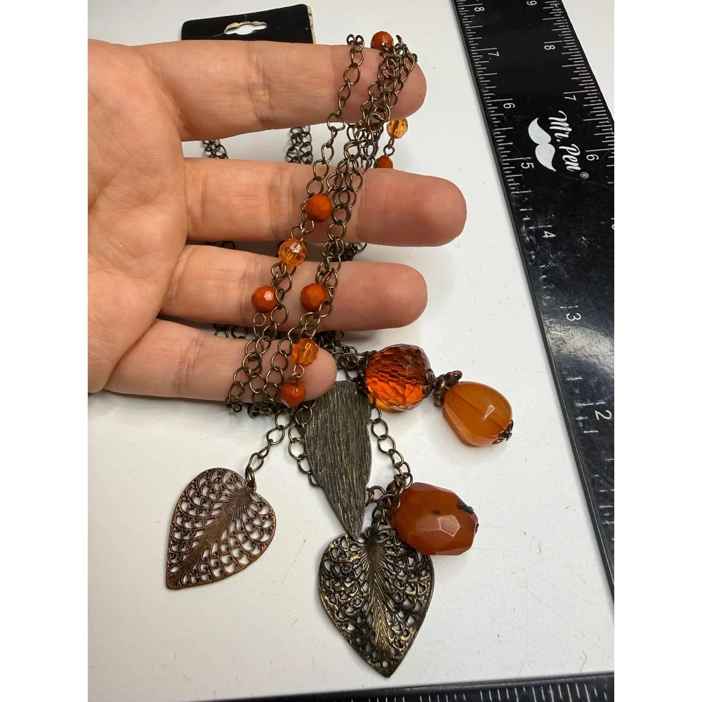 Apostrophe Bronze Tone Multi Strand Leaf Charm Orange Bead Long Necklace NWT